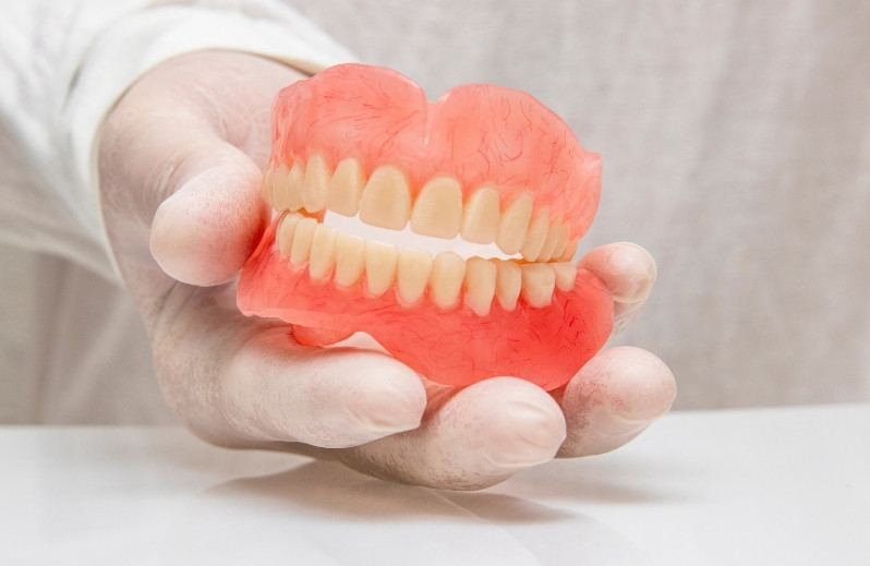 how to handle damaged dentures
